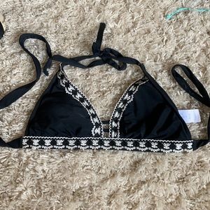 Black swim top with white knit details